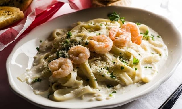 Shrimp Fettuccine Alfredo (L).